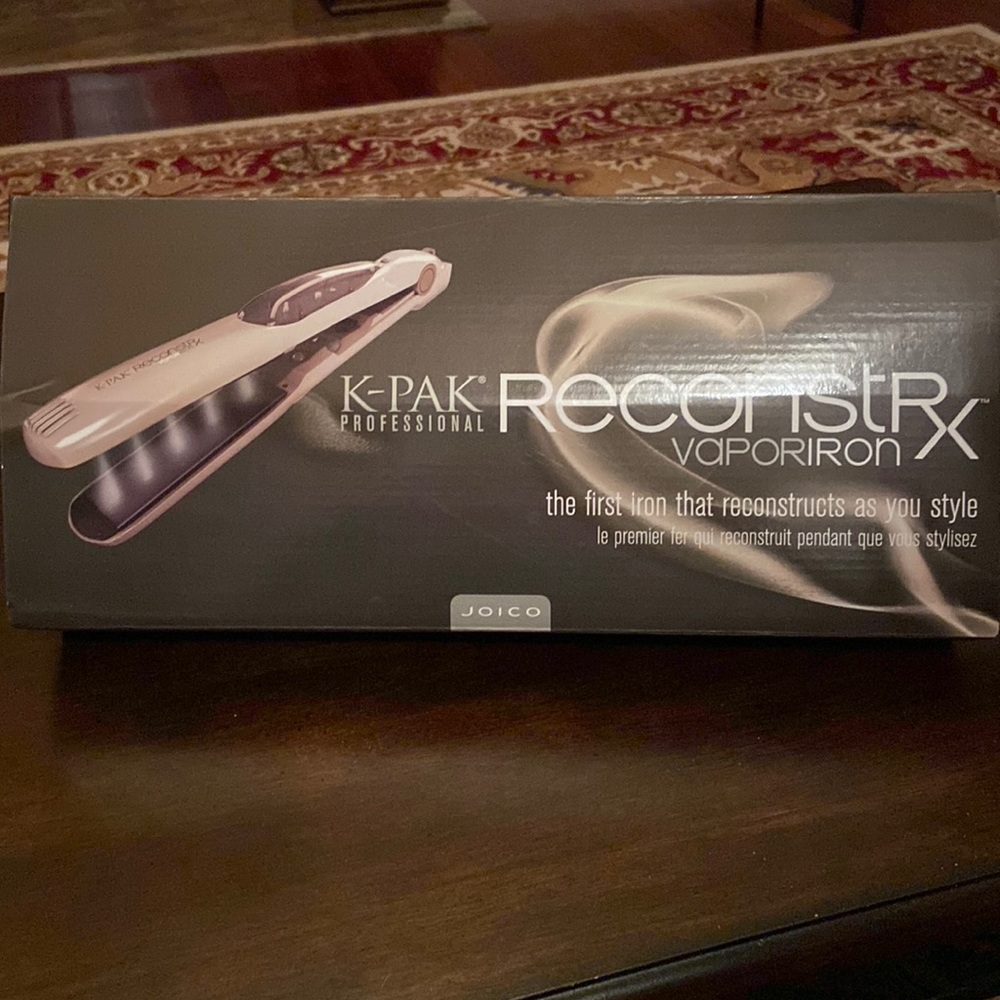 Hair straightener VAPOR IRON . Brand new in the box.